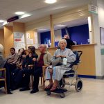A photo of a busy hospital waiting room.
